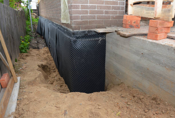 Happy homeowners after waterproofing job in Wichita